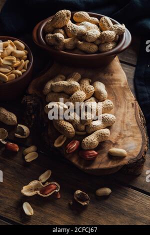 Group of peanuts on wooden boards Stock Photo
