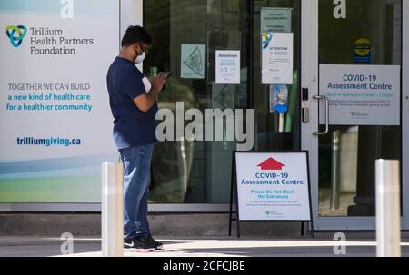 Mississauga, Canada. 4th Sep, 2020. A man wearing a face mask waits to have his COVID-19 test outside a COVID-19 assessment center in Mississauga, Ontario, Canada, on Sept. 4, 2020. There have been 130,493 cases of COVID-19 in Canada, including 9,141 deaths. Credit: Zou Zheng/Xinhua/Alamy Live News Stock Photo