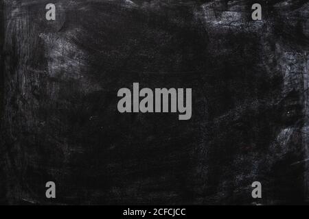 Dark distressed slate surface background Stock Photo