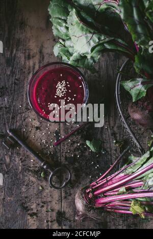 Beetroot and fresh smoothie on wooden table Stock Photo