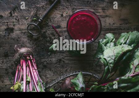 Beetroot and fresh smoothie on wooden table Stock Photo