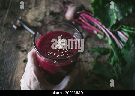 Beetroot and fresh smoothie on wooden table Stock Photo