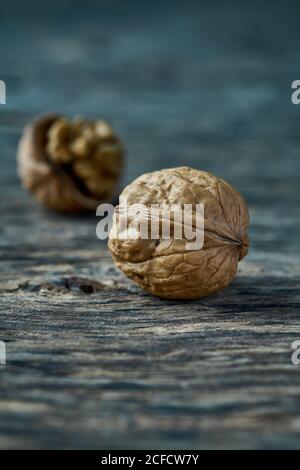 Unpeeled walnut on the table Stock Photo
