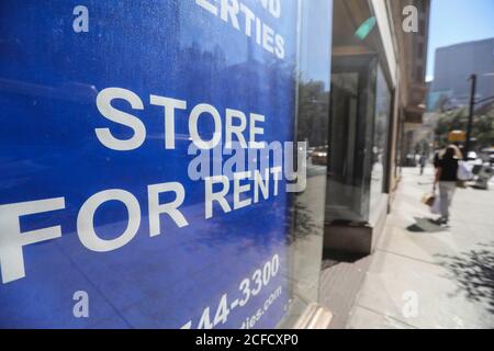 New York, USA. 4th Sep, 2020. Pedestrians walk past a store for rent in New York, the United States, Sept. 4, 2020. U.S. employers added 1.4 million jobs in August, and the unemployment rate dropped to 8.4 percent, as the nation's pandemic-ravaged labor market continues to slowly recover, the U.S. Bureau of Labor Statistics reported Friday. Credit: Wang Ying/Xinhua/Alamy Live News Stock Photo