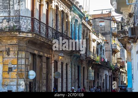 Colorful Cuban alley with old colonial house facades, Old Havana, Cuba Stock Photo