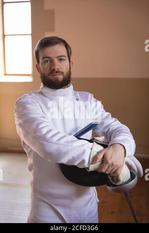 Man wearing fencing outfit Stock Photo