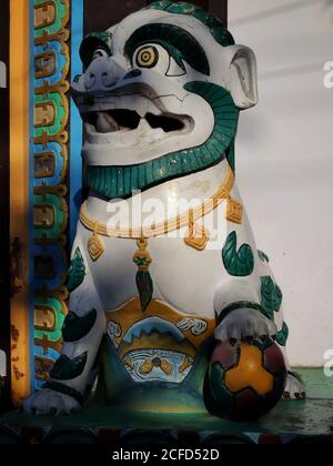 Bokeh shot of foo dog at the Budhha temple in Sarnath near Varanasi, India. Colourful images of chinese lion dog with selective focus and copy space. Stock Photo