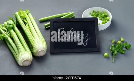 Fresh green organic celery. Celery chopped and celery stalks. Stock Photo