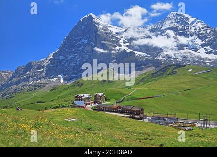 Kleine Scheidegg with mountain railway station in front of the Eiger and Moench, Wengen, Jungfrau region, Bernese Alps, Bernese Oberland, Canton of Stock Photo