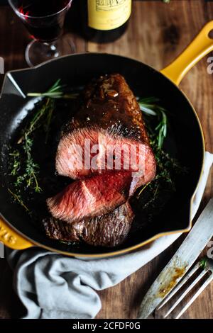 Roast beef with vegetables served on plate Stock Photo