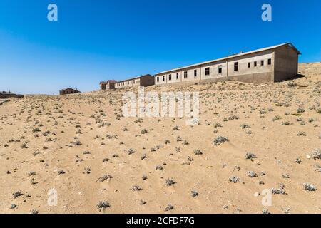 Kolmannskuppe ghost town on a guided tour on Wednesday, near Lüderitz, Namibia Stock Photo