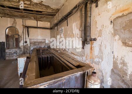 Ice factory in Kolmannskuppe ghost town on tour on Wednesday, near Lüderitz, Namibia Stock Photo