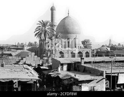 Original Caption:  Iraq. (Mesopotamia). Baghdad. Views street scenes and types. The Midan mosque  - Location: Iraq--Baghdad ca.  1932 Stock Photo
