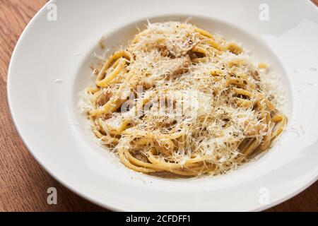 Portion of pasta with Parmesan Stock Photo