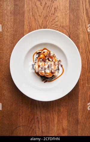 Stylish desserts with brownie and caramel Stock Photo