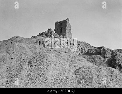 Original Caption:  Iraq. Birs Nimrud. (Possibly the Tower of Babel). So-called Tower of Babel. Distant view  - Location: Iraq--Borsippa ca.  1932 Stock Photo