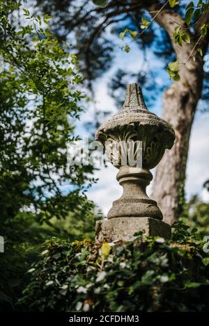 Stone sculpture, Gardens of Glenveagh Castle, Glenveagh National Park, Ireland Stock Photo