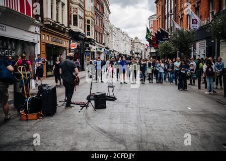 Street musicians on Grafton Street, Dublin, Ireland Stock Photo