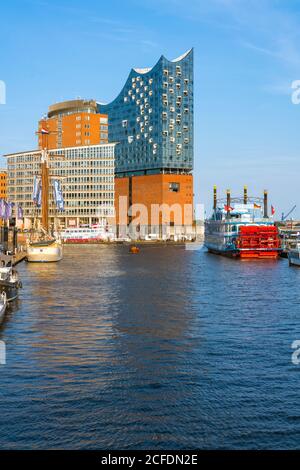 Germany, Hamburg, view from the Übersebrücke over the Niederhafen to the Elbphilharmonie, on the right paddle steamer MS Louisiana Star. Stock Photo
