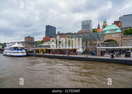 Germany, Hamburg, view from a passenger ferry to the Landungsbrücken in Hamburg St. Pauli. The party boat MS Tonne is at Landungsbrücke 7. Stock Photo