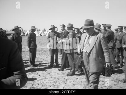 Original Caption:  Arrival in Palestine of Mr. Antony [i.e. Anthony] Eden. Mr. Antony [i.e. Anthony] Eden with men & officers of the A.I.F. [i.e. Australian Imperial Forces]  - Location:  ca.  February 1940 Stock Photo