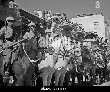 Middle East History - Amman. 24th anniversary of Arab revolt under King Hussein & Lawrence celebration Sept. 11 1940. Cavalry of the Arab Legion lining the streets Stock Photo