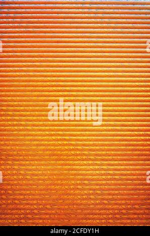 Orange red colored abstract background with pattern stripes and gradient. Stock Photo