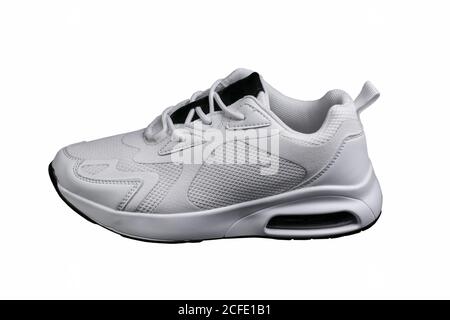 White sneaker with black accents isolated. Sports shoes on a white background. Stock Photo