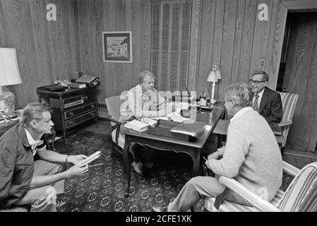 'Zbigniew Brzezinski, Jimmy Carter, Cyrus Vance and Harold Brown confer on the mid-east peace accords at Camp David. ca.  09/15/1978' Stock Photo