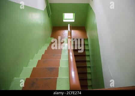 Green staircase in the office corridor. Stock Photo