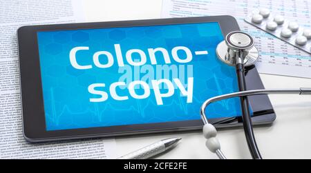 The word Colonoscopy on the display of a tablet Stock Photo