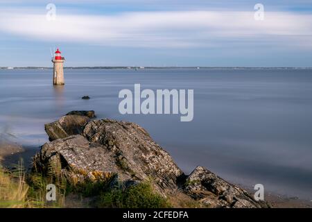 France - Loire Atlantique - August 2020 - View of the lighthouse of Villès-Martin in long exposure Stock Photo