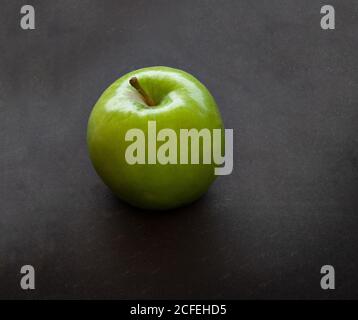Green apples on dark background Stock Photo
