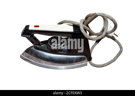 An old, classic electric iron for ironing, isolated on a white background with a clipping path. Stock Photo