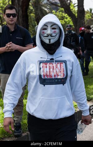 Melbourne, Australia 5 Sep 2020, a protestor wearing a Guy Fawkes mask at the Freedom Day Anti-mask and anti lockdown protest as it moved to Albert Park Lake in Melbourne Australia. Credit: Michael Currie/Alamy Live News