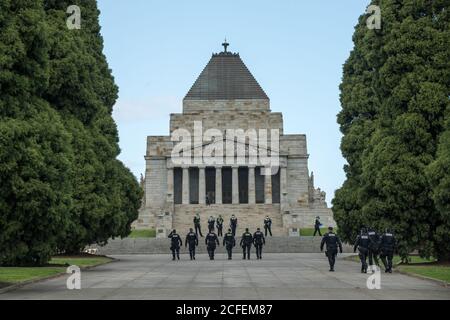 Melbourne, Australia 5 Sep 2020, Victorian Police Public Order Officers walk towards the shrine forecourt at the conclusion of the Freedom Day Anti-mask and anti lockdown protest at the Shrine of Remembrance in Melbourne Australia. Credit: Michael Currie/Alamy Live News