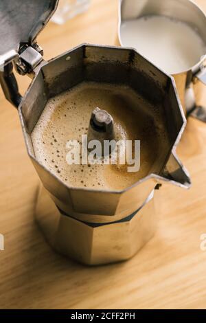Geyser coffee maker and milk pitcher Stock Photo