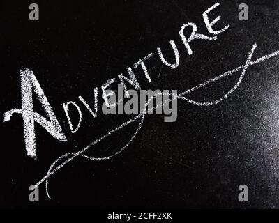 Adventure word displayed on chalkboard for learning and awareness terminology for education purpose. Stock Photo