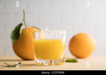 Orange juice in glass on the table Stock Photo