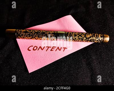 Content word displayed on paper slip concept for educational informative awareness.