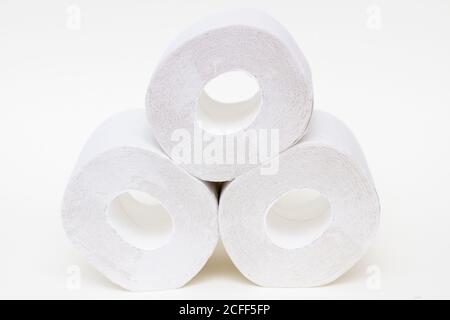 Stack of toilet paper rolls on white background Stock Photo
