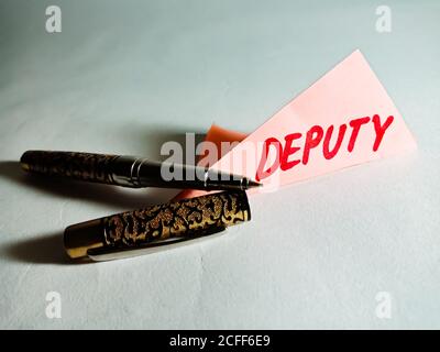 Deputy word displayed on paper slip concept for educational informative awareness.