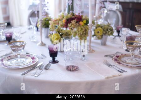 a dinner setting on a table within a historic home in Lenox, Massachusetts, New England, Stock Photo