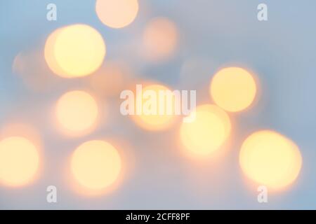 Christmas gold background, golden blurred lights, bokeh background. Stock Photo