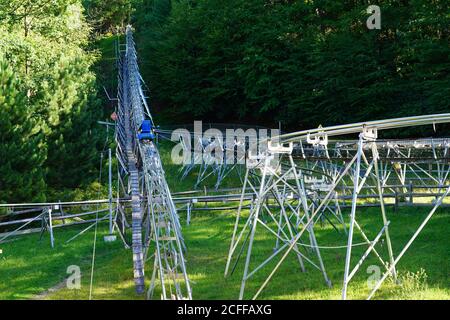 TANNERSVILLE, PA -30 AUG 2020- View of the mountain slide Alpine coaster at the Camelback Mountain Resort, a large ski resort in the Poconos mountains Stock Photo