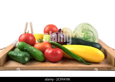 Assortment of various fresh vegetables on a white background. Stock Photo