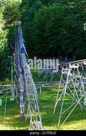 TANNERSVILLE, PA -30 AUG 2020- View of the mountain slide Alpine coaster at the Camelback Mountain Resort, a large ski resort in the Poconos mountains Stock Photo