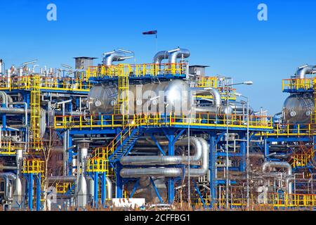Oil industry equipment installation, metal pipes and constructions. Stock Photo