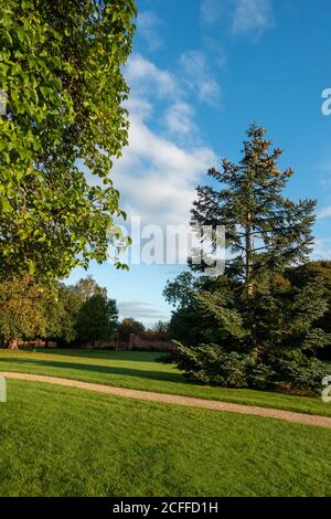 Country House garden with winding gravel path Stock Photo