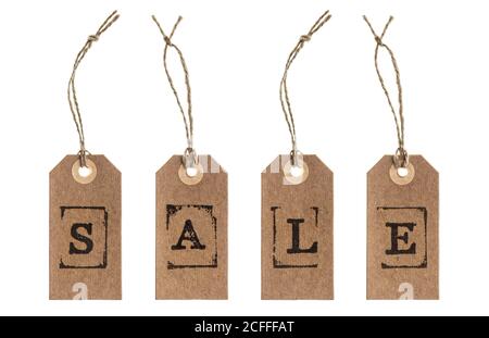 Brown recycled paper tags with letters SALE isolated on white background Stock Photo